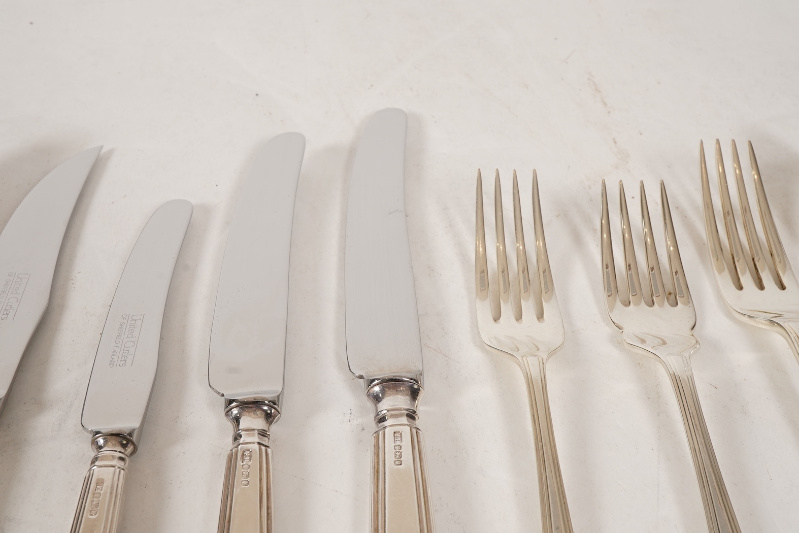 An Elizabeth II matched canteen of silver Grecian pattern cutlery for eight